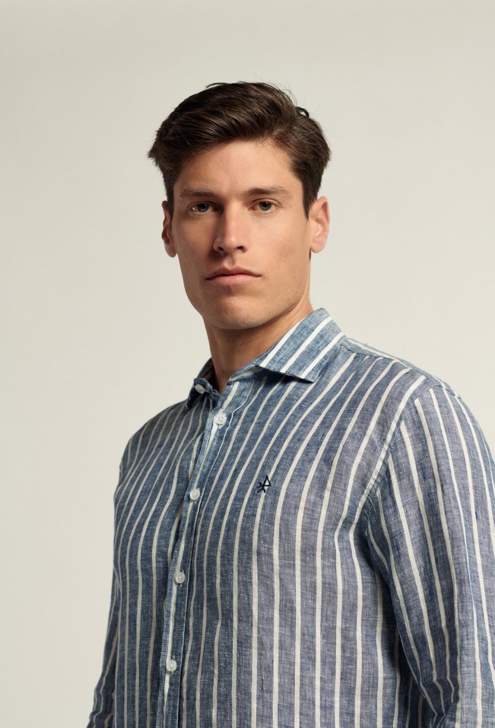 CAMISA H LINO RAYAS - 48.93