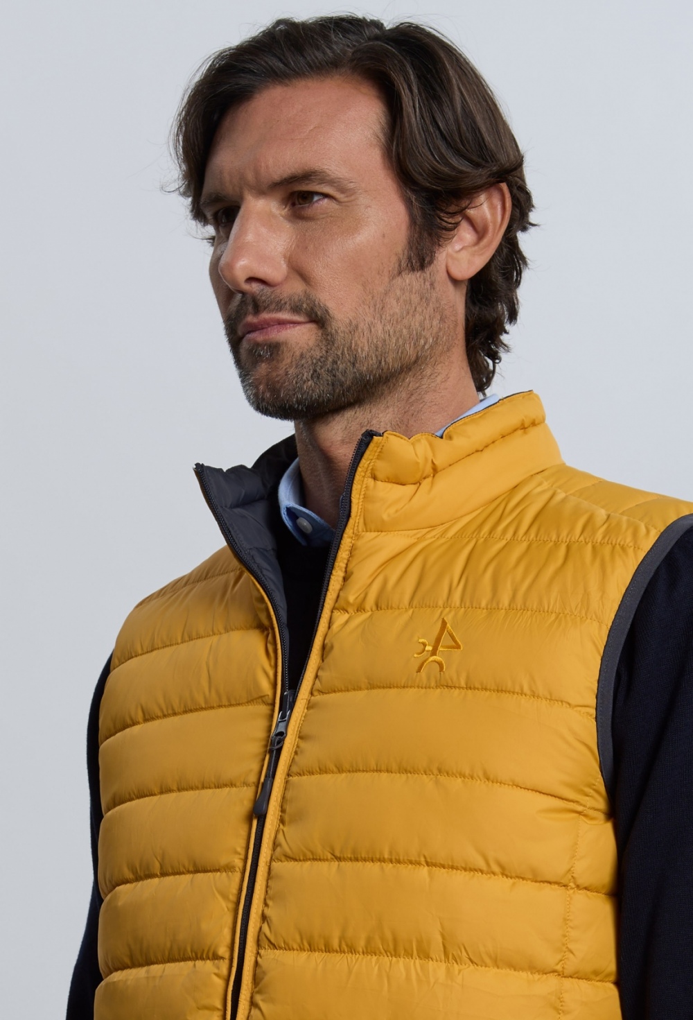 Chaleco acolchado reversible gris con amarillo - 89.95